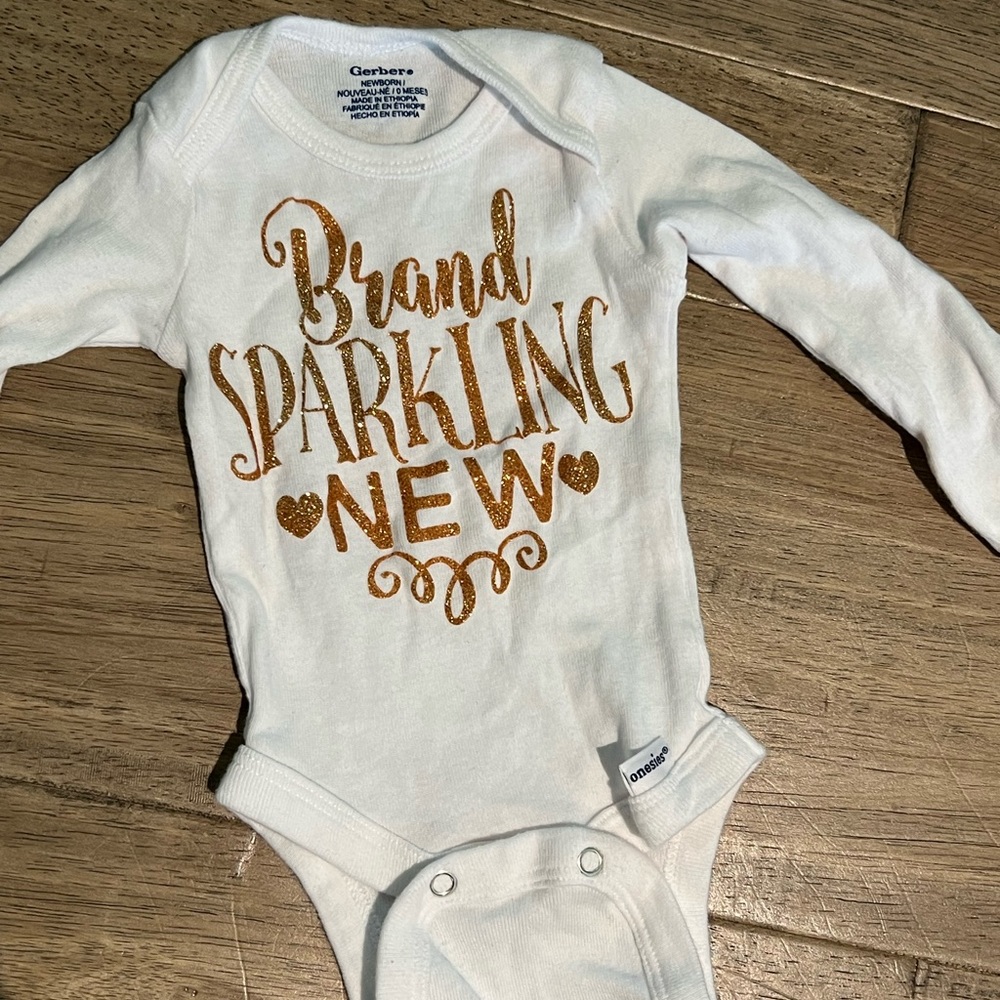 Baby newborn “brand sparkling new” onesie